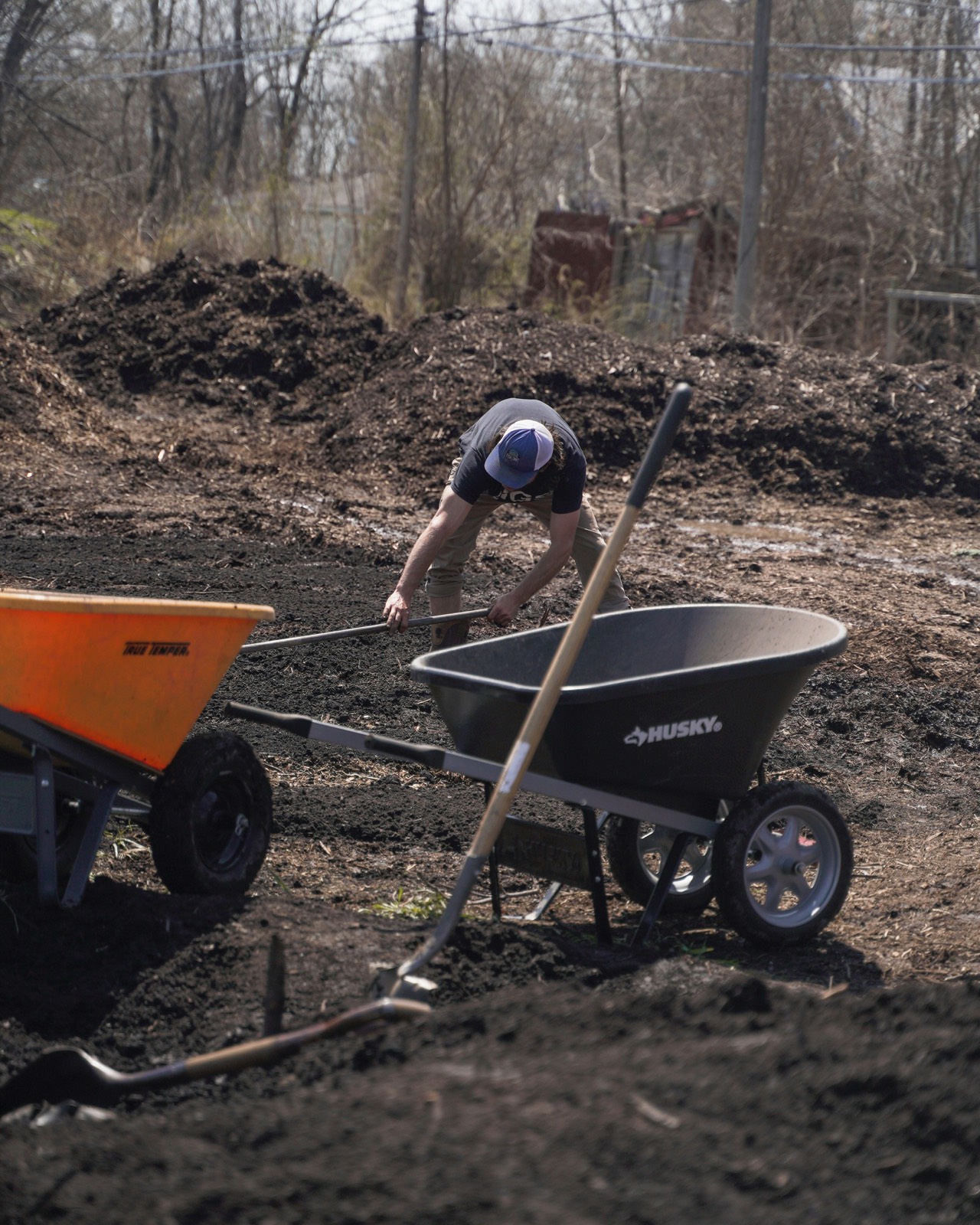 Tradie preparing landscaping materials on a job site