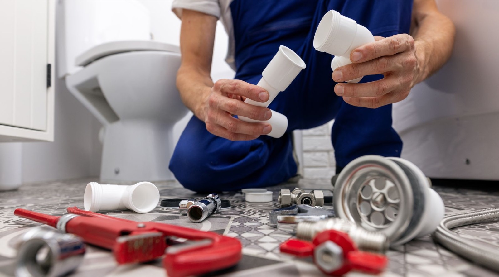 Plumber fitting bathroom pipe components and repair parts